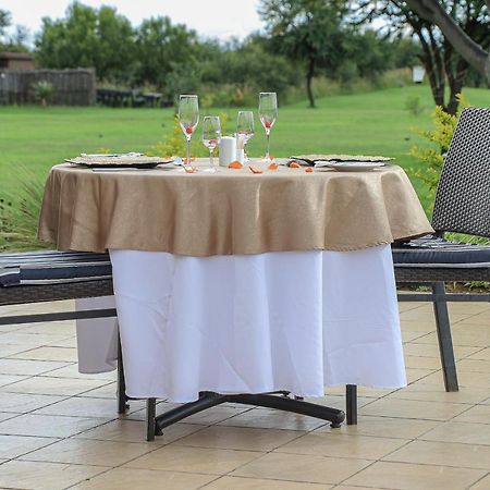 Royal Marang Hotel Phokeng Dış mekan fotoğraf A table with a tablecloth