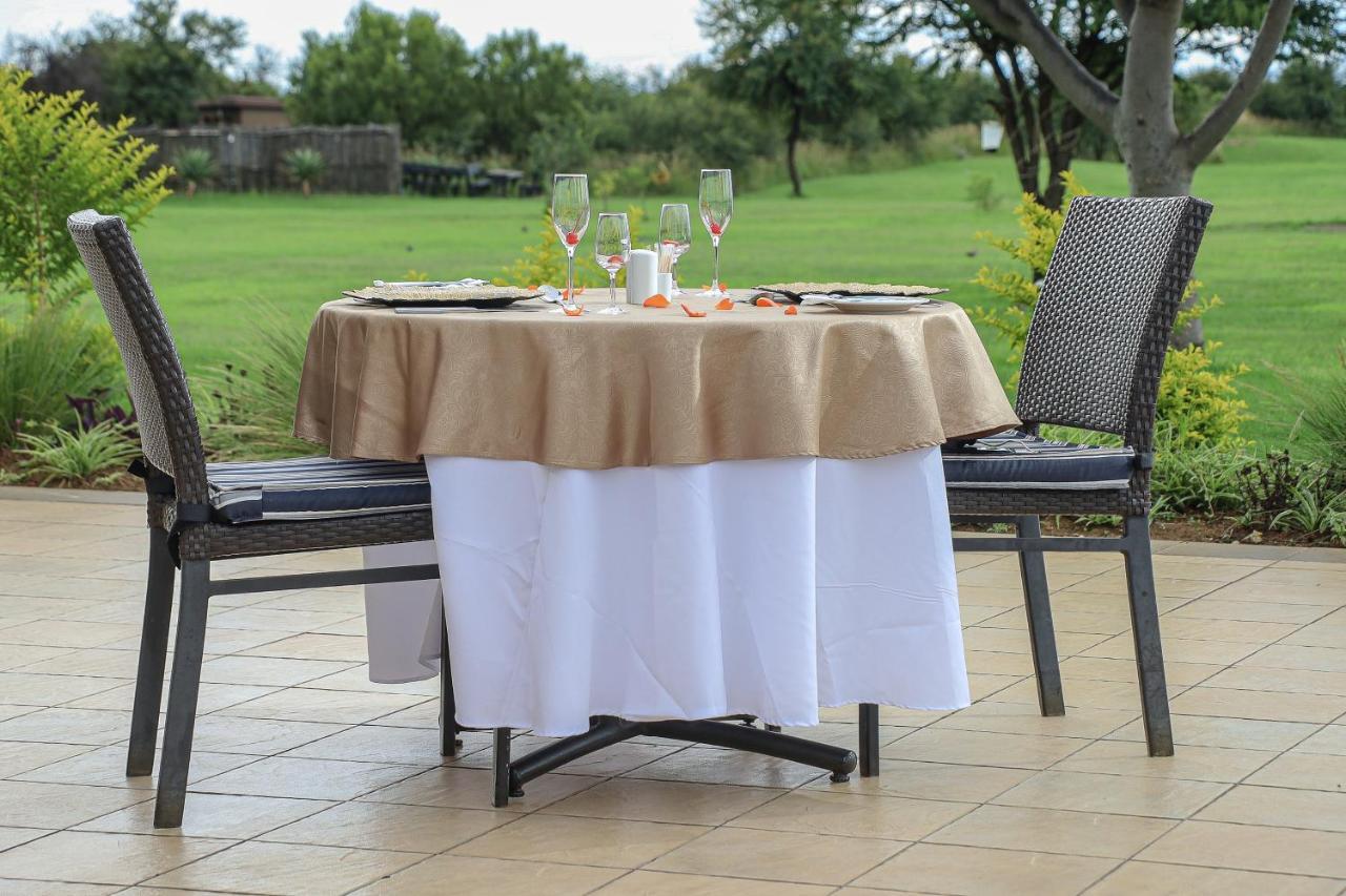 Royal Marang Hotel Phokeng Dış mekan fotoğraf A table with a tablecloth
